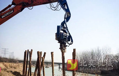 Steel pile pile driver protects embankment